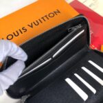 Louis Vuitton Vertical Zipped Wallet – M62295